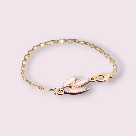 Armband goud met roze fantasie